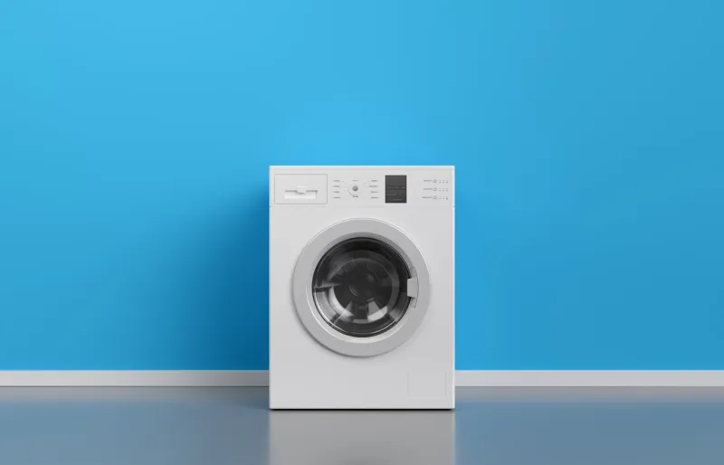 washing machine at blue wall, frontal view with copy space,3d rendering (general design and captions)