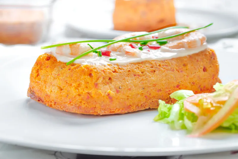 delicious fish cake hake cake with tomato, shrimps, chive and salad cream