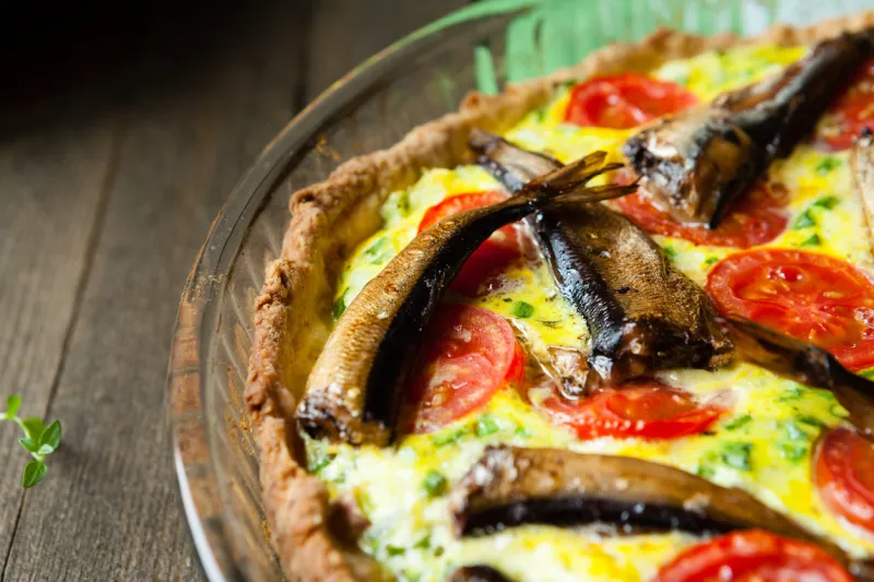 homemade pie with fish and vegetables, closeup