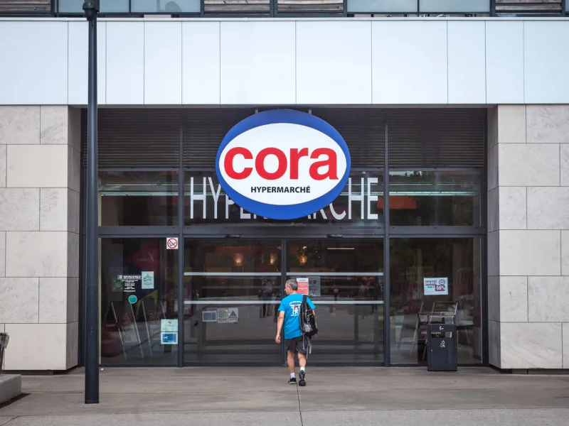 picture of a sign with the logo of cora on their local supermarket in lyon, france cora is a retail group of hypermarkets located in france and elsewhere in europe cora was founded in 1974 by the supermarket holding louis delhaize group