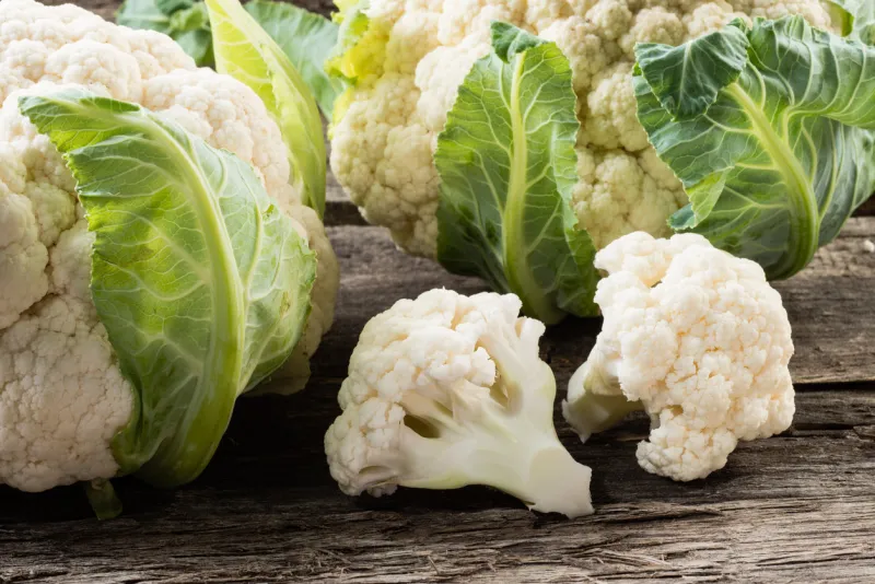 organic cauliflower on wooden background