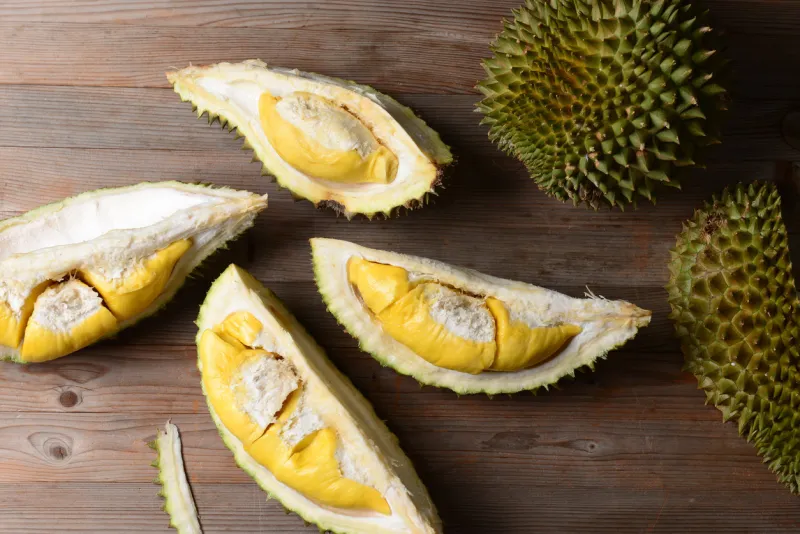 durian riped and fresh ,durian peel with yellow colour on wooden table
