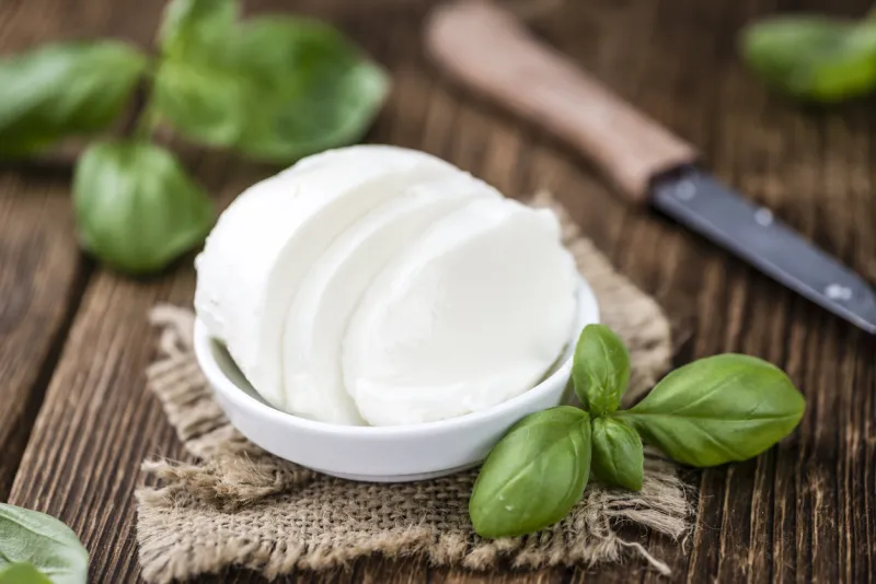 big mozzarella ball as detailed close-up shot (selective focus)