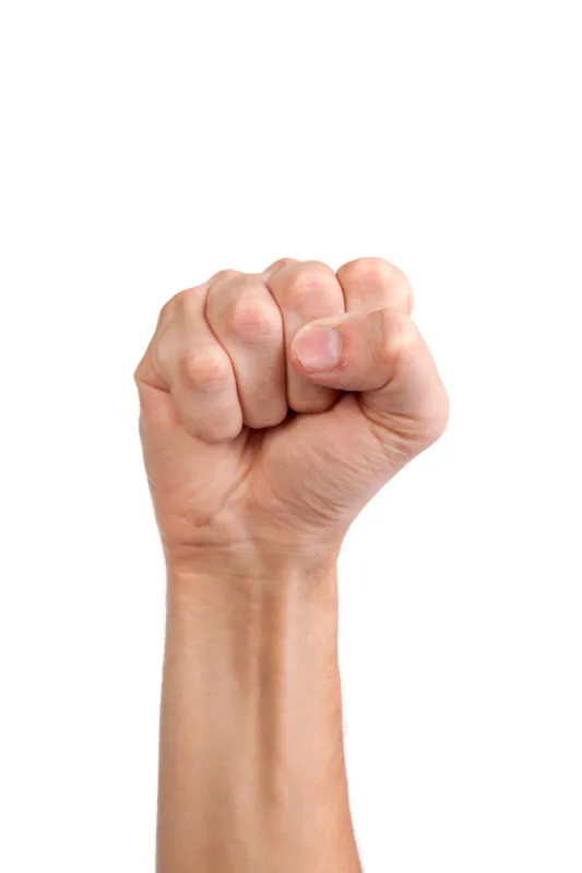hand with clenched a fist, isolated on a white background