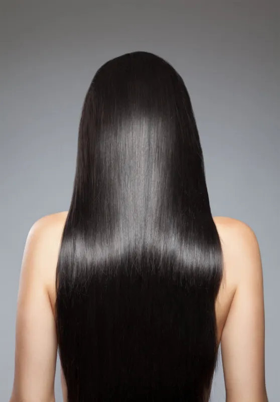 back view of a woman with long straight hair