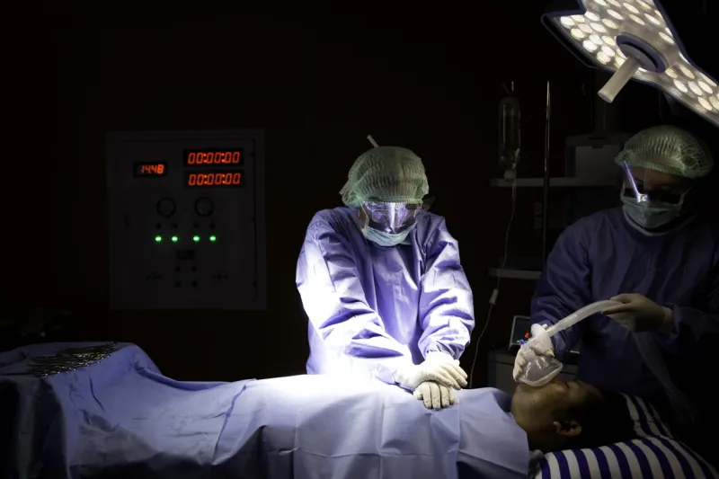 surgeons doctor doing emergency first aid by cardio pulmonary resuscitation or cpr emergency cpr for heart attack