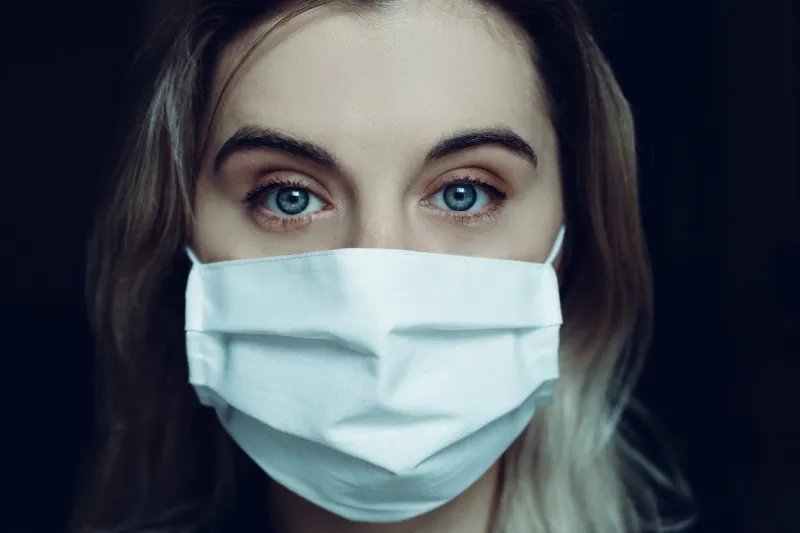 young woman wearing a medical mask