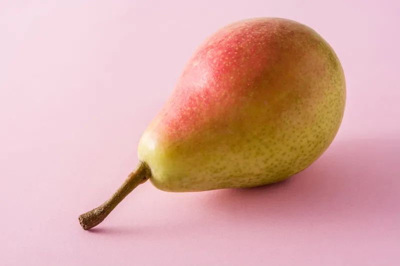 pear on pink background
