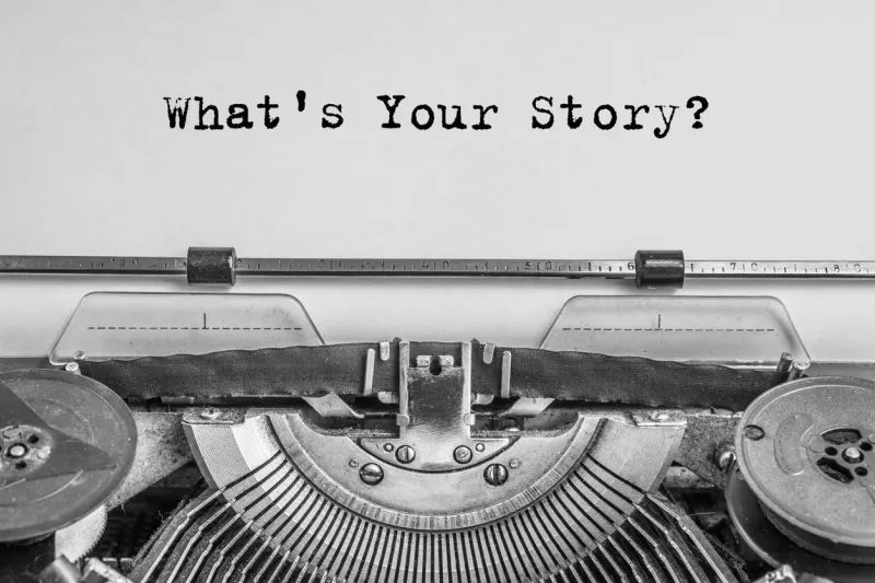 what's your story? the text is typed on paper with an old typewriter, a vintage inscription, a story of life