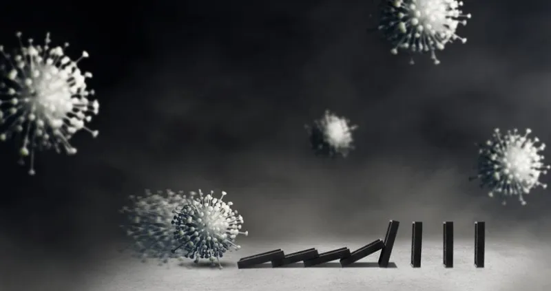 business crisis, domino effect and corona virus concept   corona virus floating in air and bumping dominoes fall on concrete floor