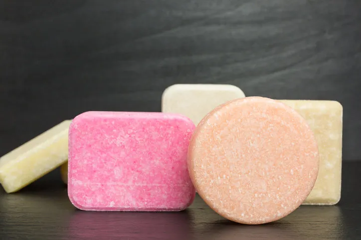 bars of eco friendly solid shampoo to avoid plastic packaging - zero waste concept