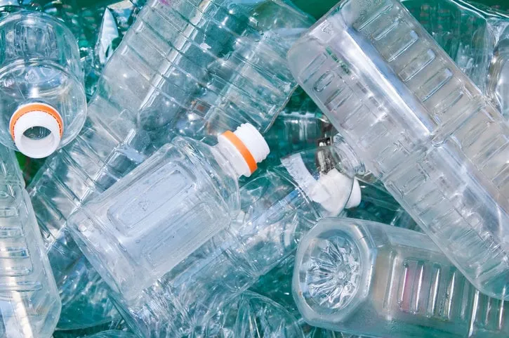 many empty plastic bottles in trash sorted for recycling
