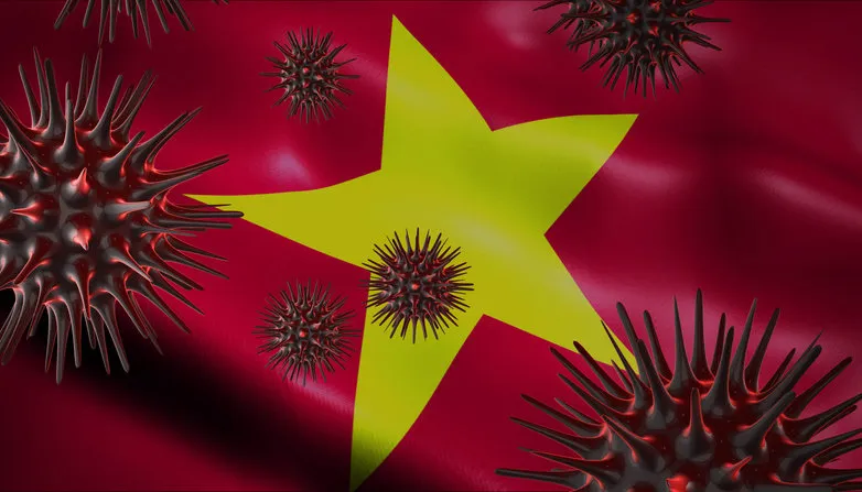 a coronavirus spinning with vietnam flag behind as epidemic outbreak infection in vietnam