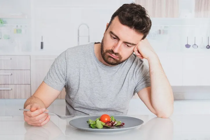 sad man diet ready to eat salad for weight loss