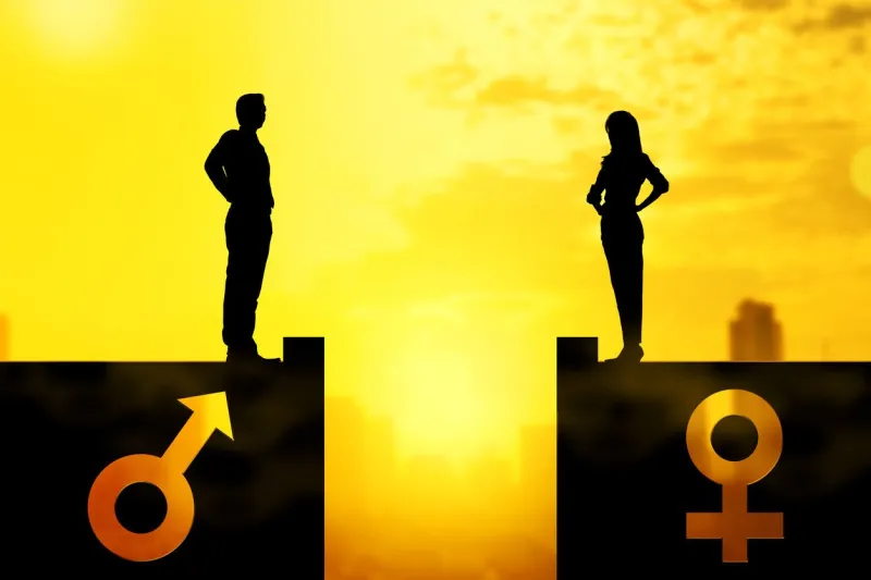 silhouette of businessman and businesswoman standing on the rooftop with same height equality gender concept