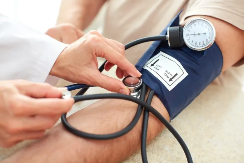 blood pressure measuring doctor and patient health care