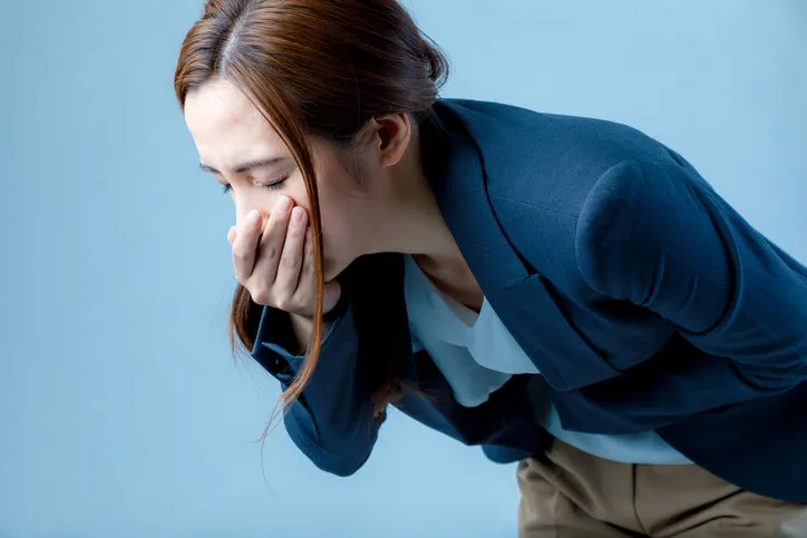 young woman feeling nauseated