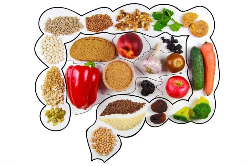 food for bowel health kefir, bifidobacteria, greens, apples, fiber, dried fruits, nuts, pepper, whole bread, cereals, broccoli chickpeas flax seed isolate on a white background