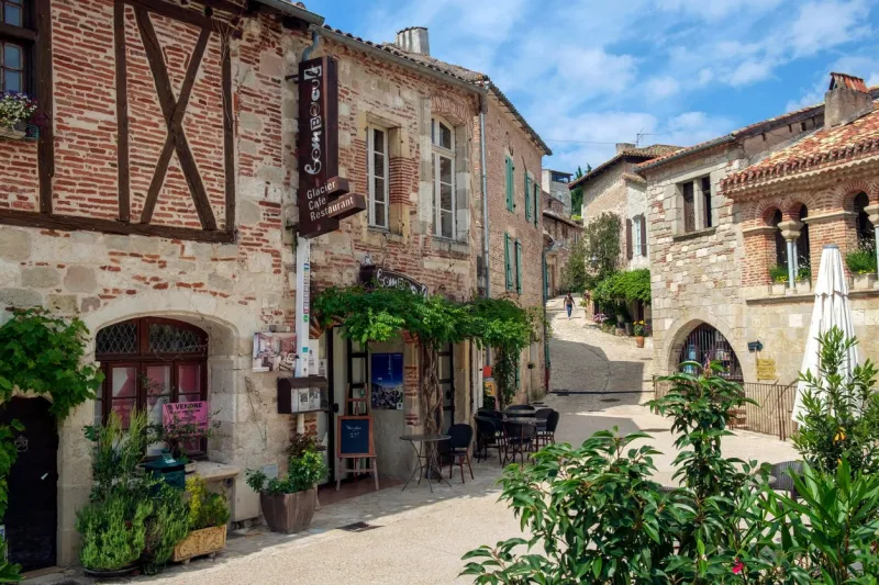 penne d'agenais, france - 14th june 2018  in early summer sunshine the picturesque streets of travel destination penne d'agenais are almost empty, lot et garonne, france