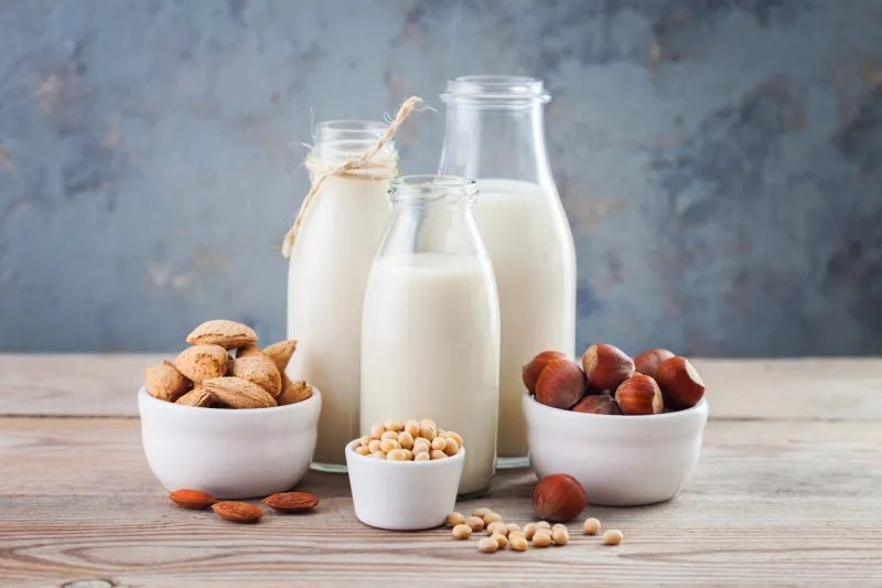 dairy free milk drink and ingredients for breakfast - food and drink
