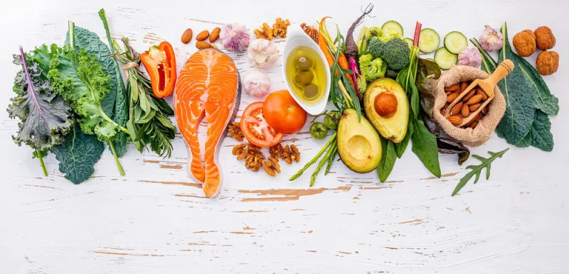 ketogenic low carbs diet concept ingredients for healthy foods selection on white wooden background balanced healthy ingredients of unsaturated fats for the heart and blood vessels