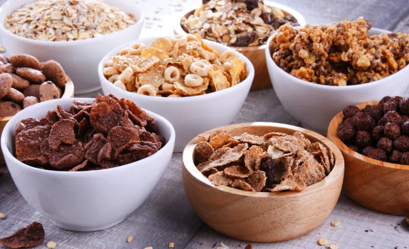 bowls containing different sorts of breakfast cereal products