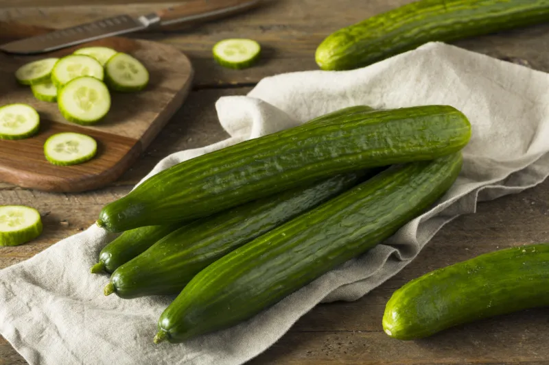 raw green organic european cucumbers ready to eat