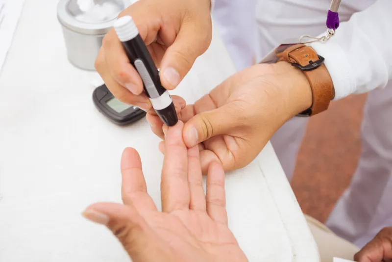 diabetes checking blood sugar levels senior citizen in health campaign