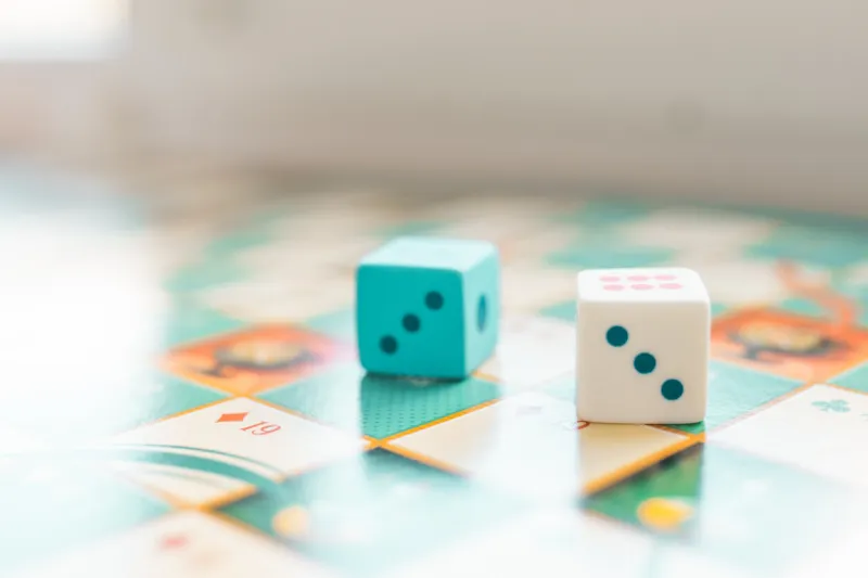 board game with dice closeup play games concept