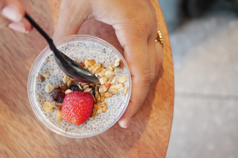 delicious chia seed pudding topped with granola and fresh strawberries, perfect for a healthy breakfast