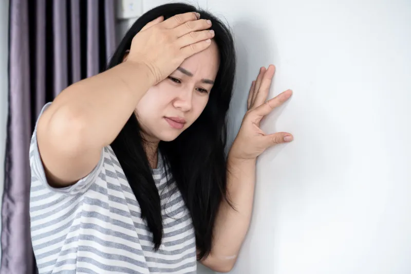 femme qui a un vertige