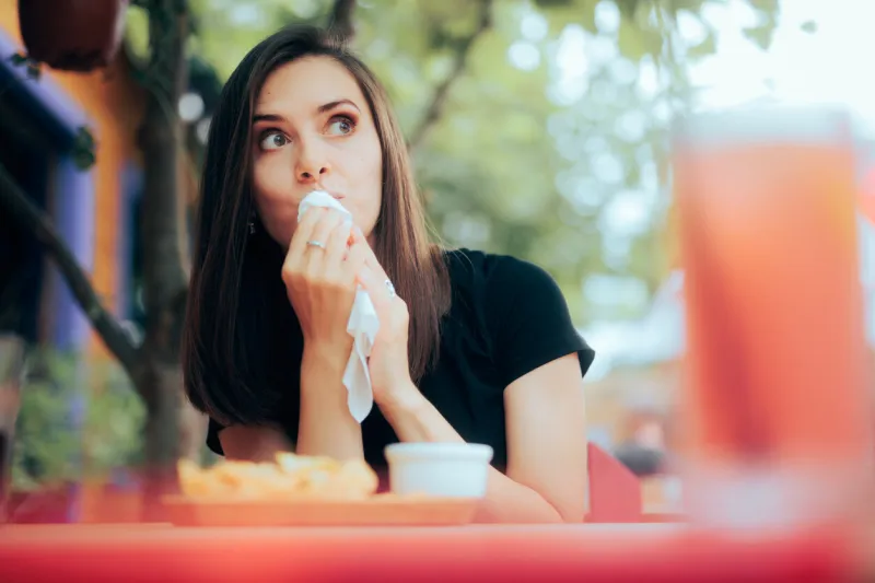 cheerful customer having the proper etiquette while dining out