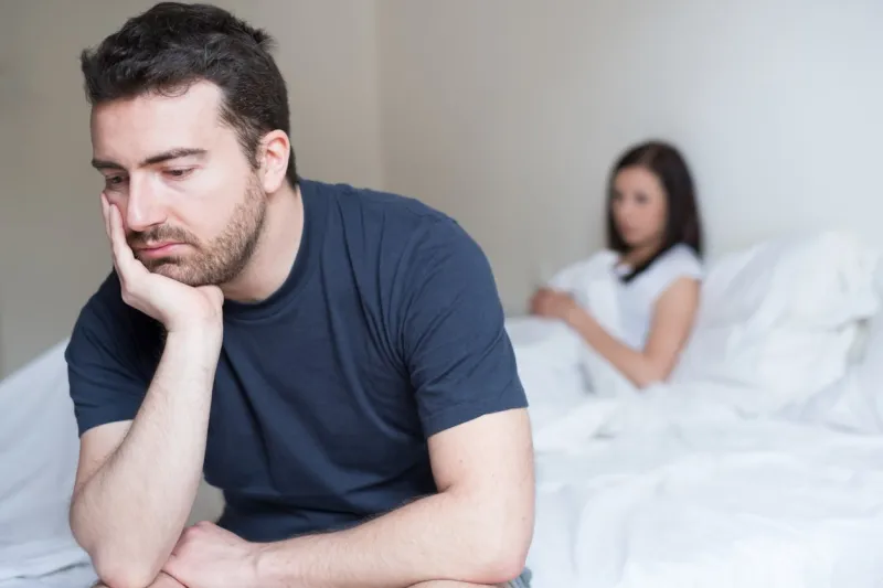 sad and thoughtful man after arguing with his girlfriend