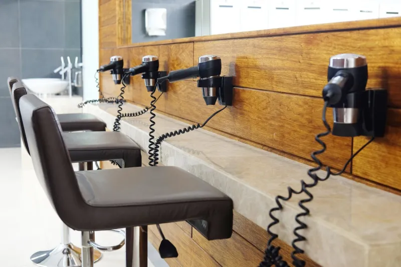 hair dryers in a checkroom