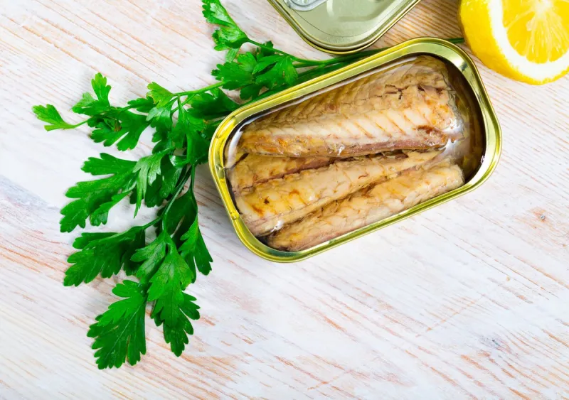 close up of canned mackerel fillets in sunflower oil