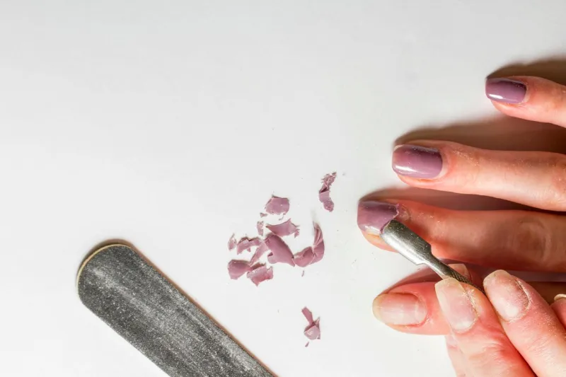 removal of nail polish on a natural white background