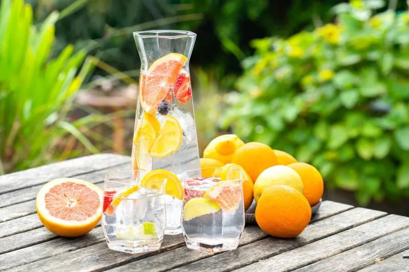 sparkling water with citrus, cold drink for the summer