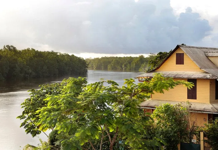 view on oyak river, roura village, french guiana france