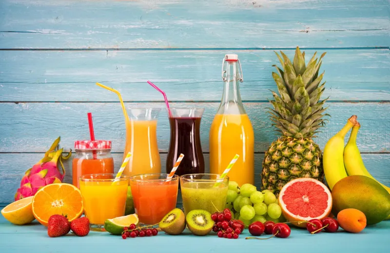 various freshly squeezed fruits juices