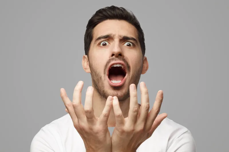 why? young man asking somebody about wrong decision, gesturing with both hands