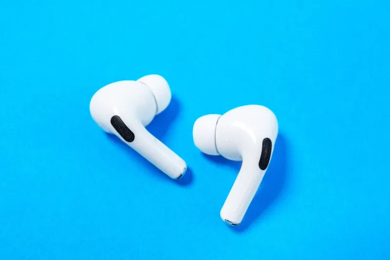 rostov, russia - july 06, 2020  apple airpods pro on a blue background silent wireless headphones close up