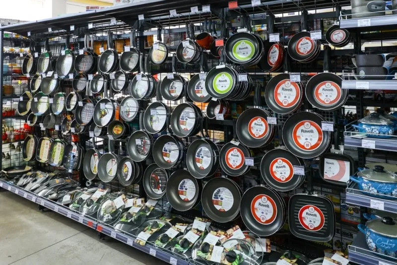 a,store,display,of,various,pans,and,pots,the,pans