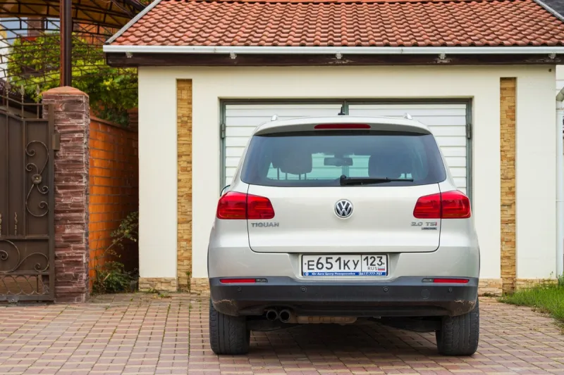 sochi  new volkswagen tiguan parked near garage