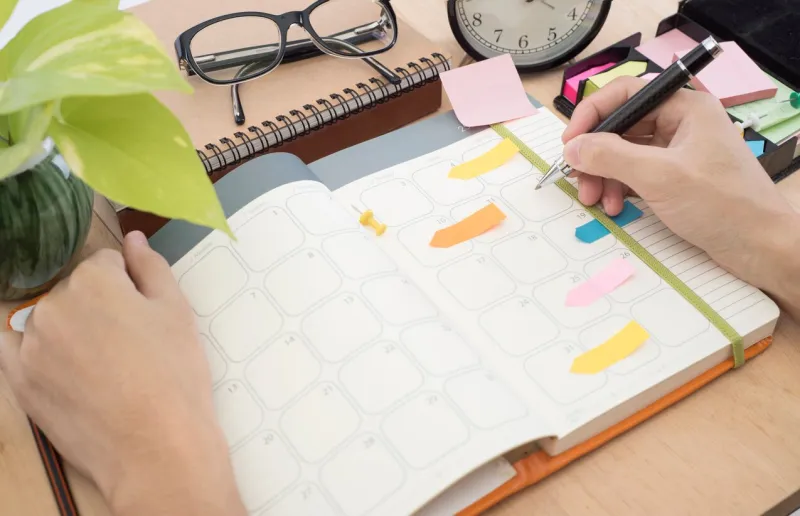 business calender planner meeting on desk office organization management remind concept