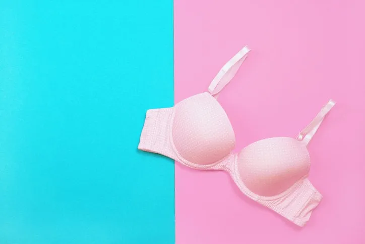 bra on hanger on two tone background