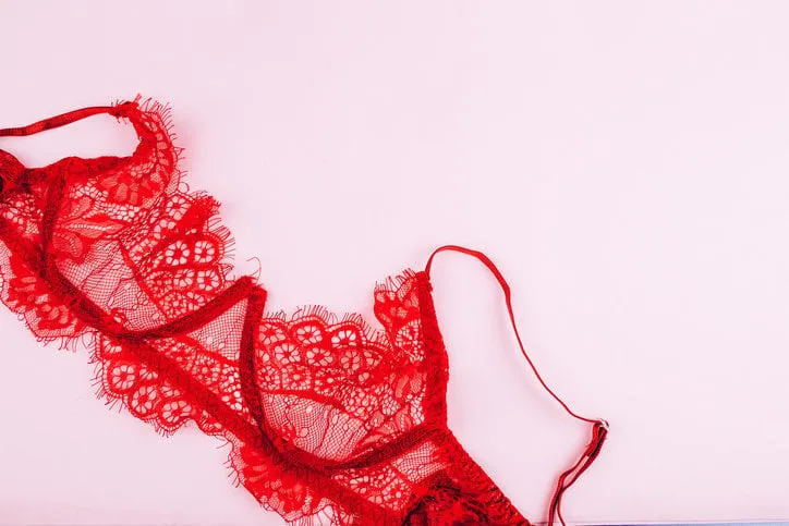 sexy red bra on a pink background, red lace underwear
