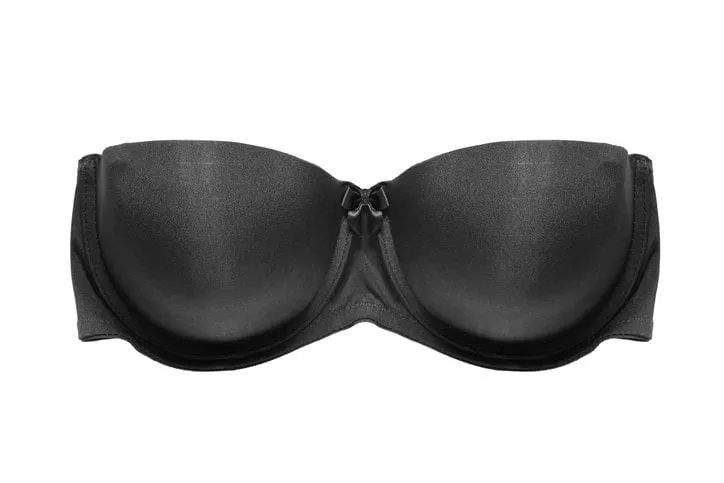 black strapless balconette bra on white background
