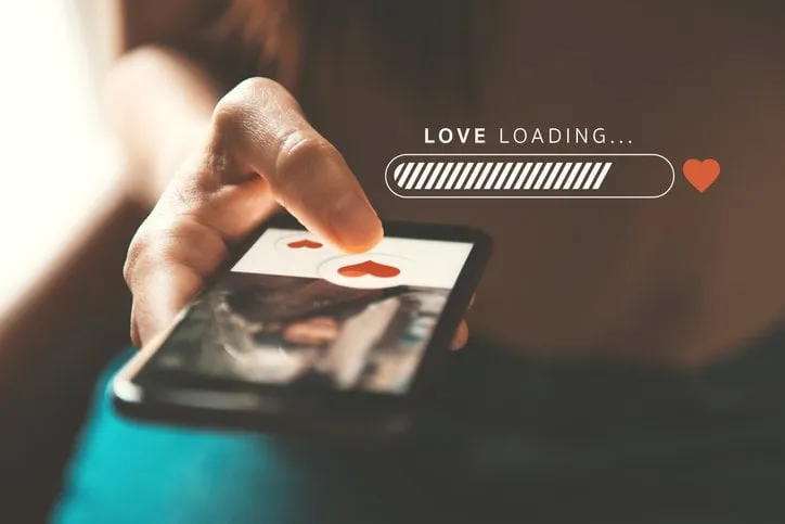love loading progress, finger of woman pushing heart icon on screen in mobile smartphone application online dating app, valentine's day concept