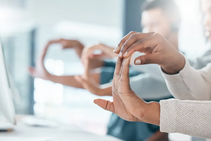 call center, contact us and team stretching hands and ready to start networking, talking and helping clients with advice communication, consultants and agents training fingers in a warm up exercise