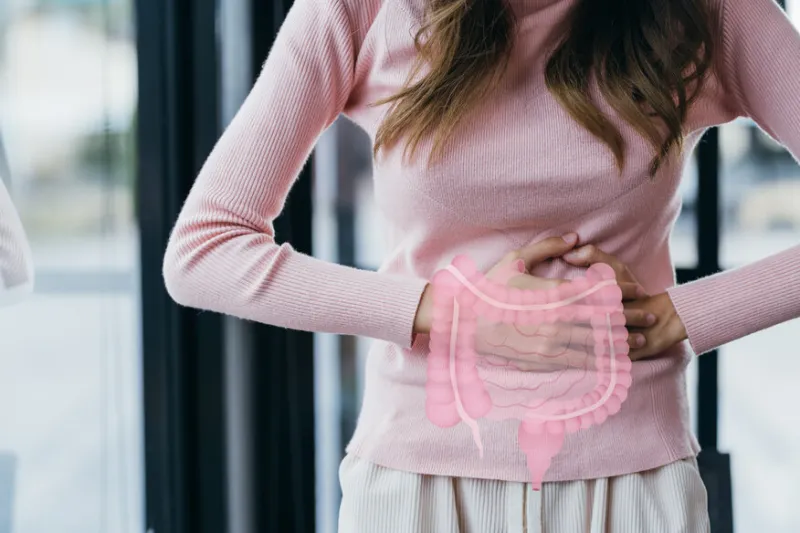 woman hands touching on stomach with intestine virtual icon, probiotics food for gut health, colon cancer, bowel inflammatory healthy feminine concept